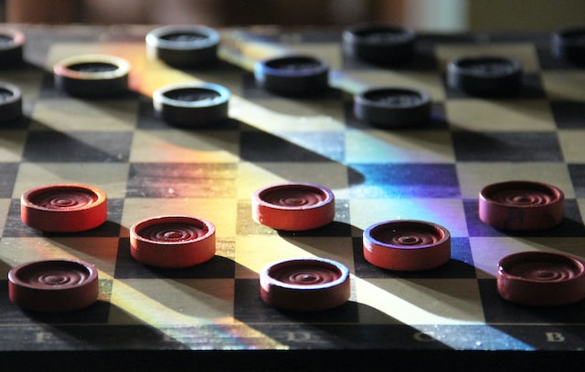 Checkers on a board