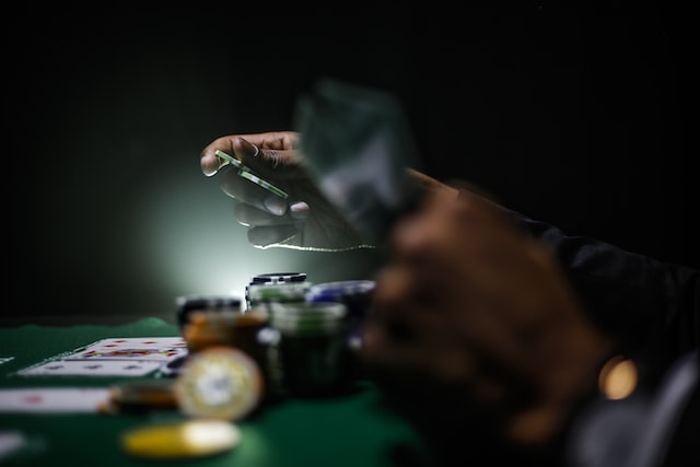 Placing a bet at a poker table