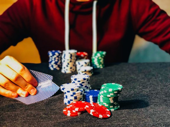 Poker player checking his poker hand