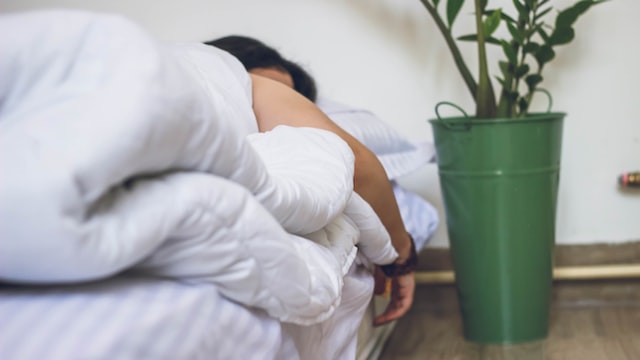 A person sleeping in bed